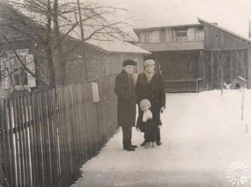 A.V. Glebov with relatives near the house. 1970s