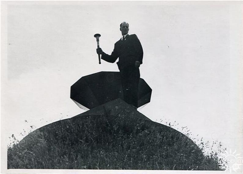 S. Pashkevich igniting the Eternal Flame at the Mound of Immortality during the opening of the Park of the 50 Years of Soviet Power. 1967