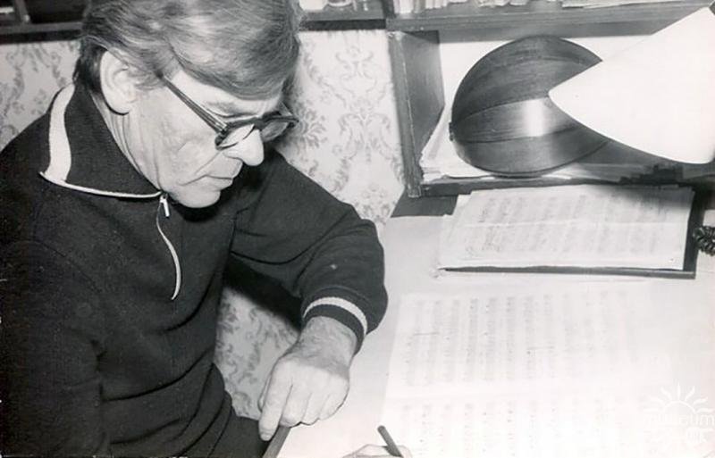 N.M. Petrenko at the desk while working on the song 